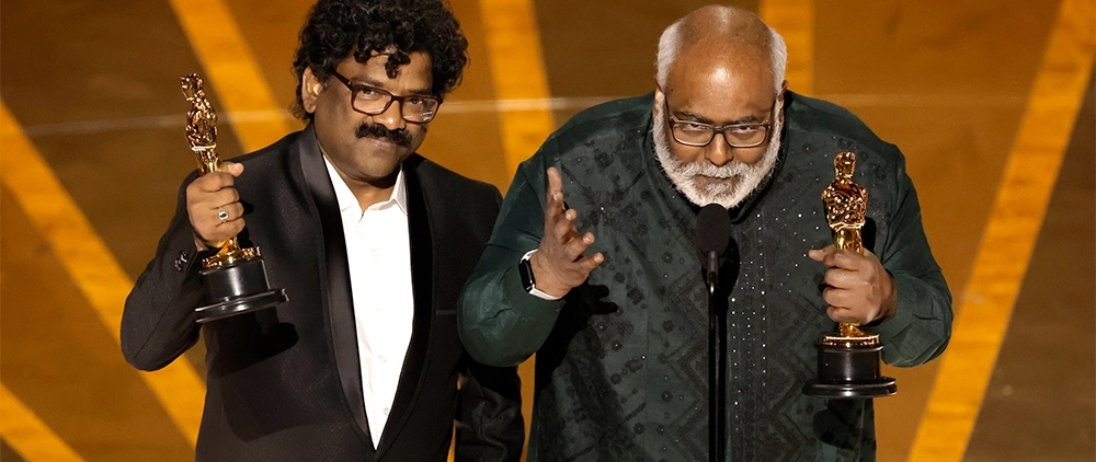 Oscar winners M.M Keeravani and Chandrabose accepting the award for Best Original Song.