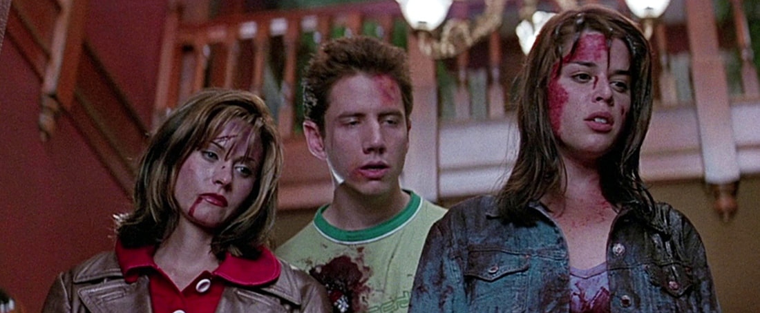 Courtney Cox, Jamie Kennedy and Neve Campbell in Scream (1996).