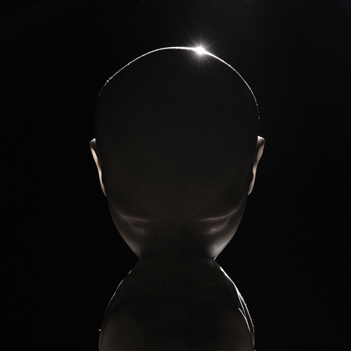 Swedish House Mafia Ray of Solar cover art, showing a human-like head shape on a black background