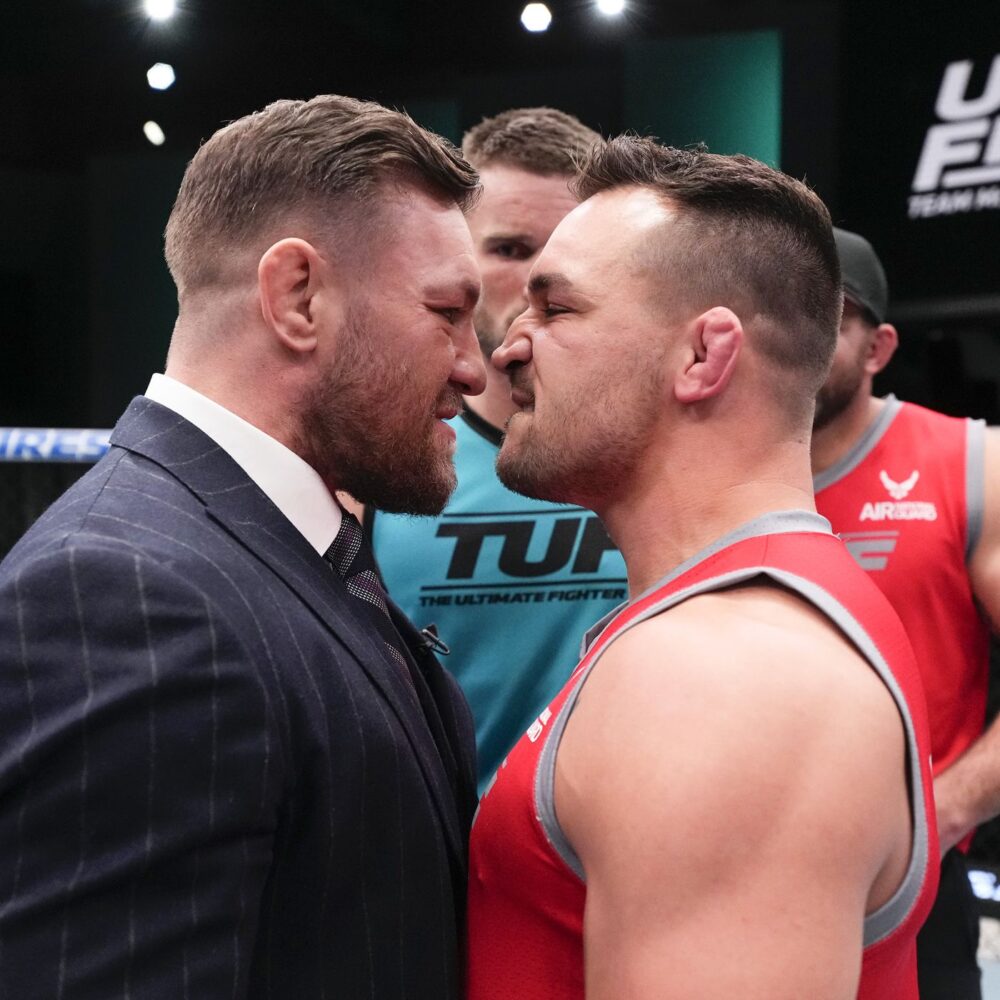 Conor McGregor and Michael Chandler share a heated moment after a Team Chandler victory.